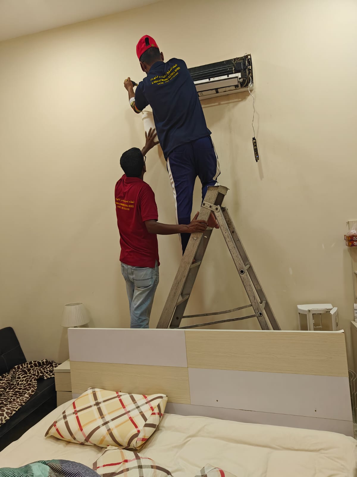 Technician repairing appliance